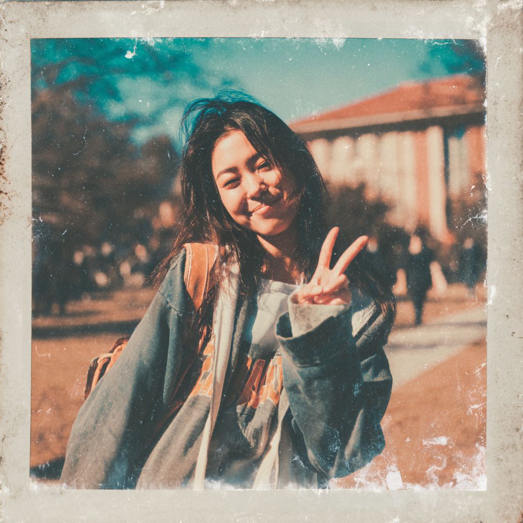 The photo features an Asian girl making a peace sign with a vintage blurry campus background