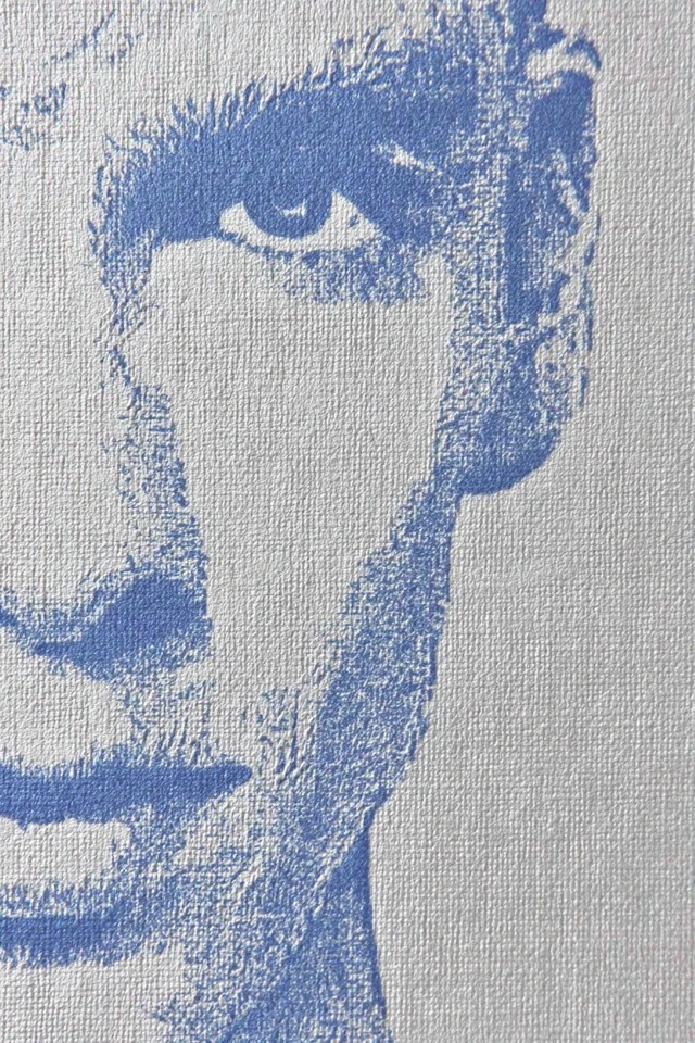 Close-up of blue halftone print on textured canvas