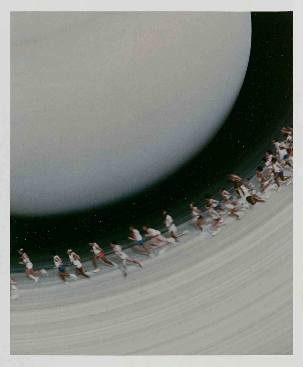 A retrofuturist photograph of Saturn with a marathon race on its ring