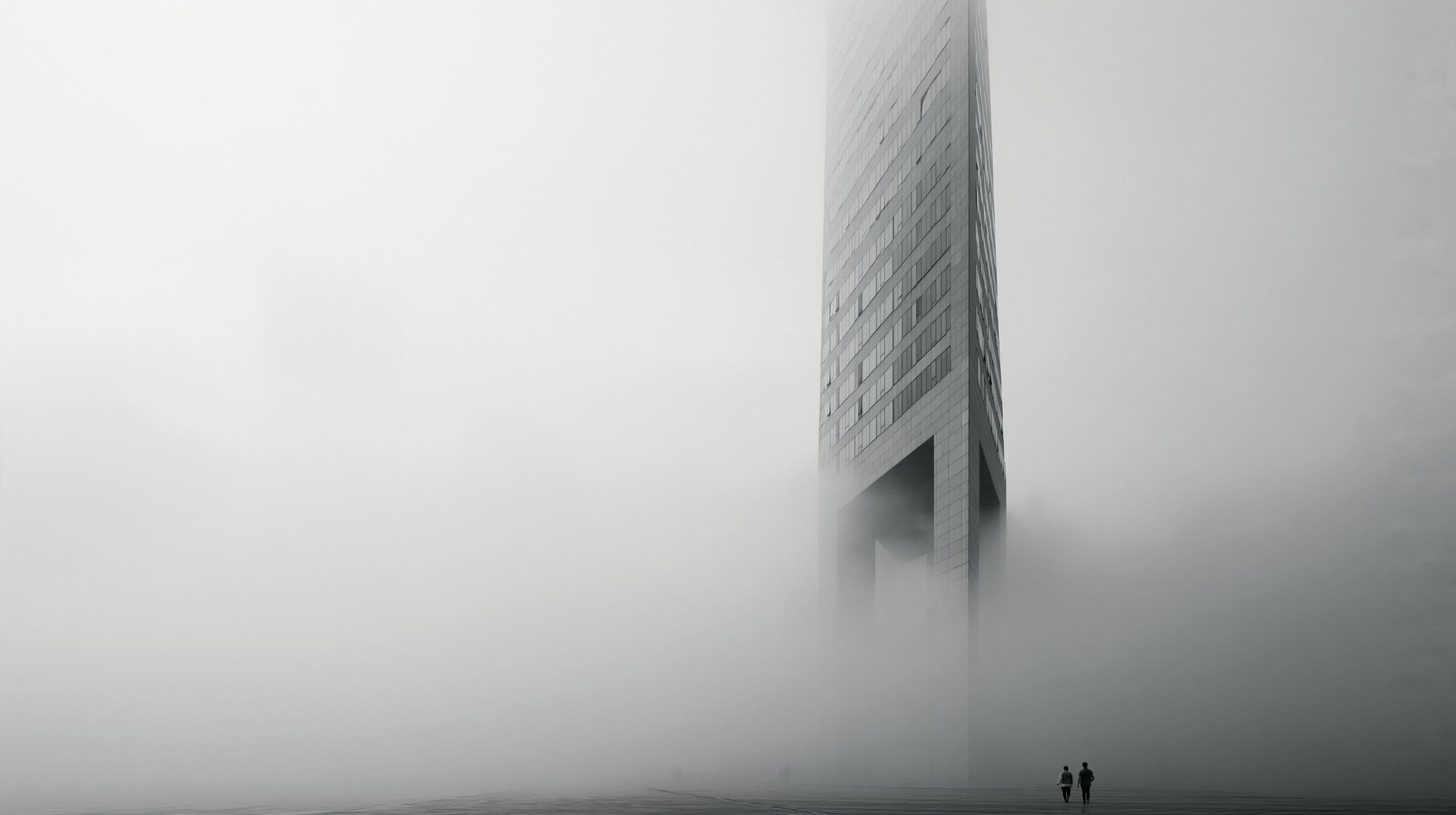 一幅極簡的黑白建築攝影作品展現了從薄霧中現身的孤獨城市結構