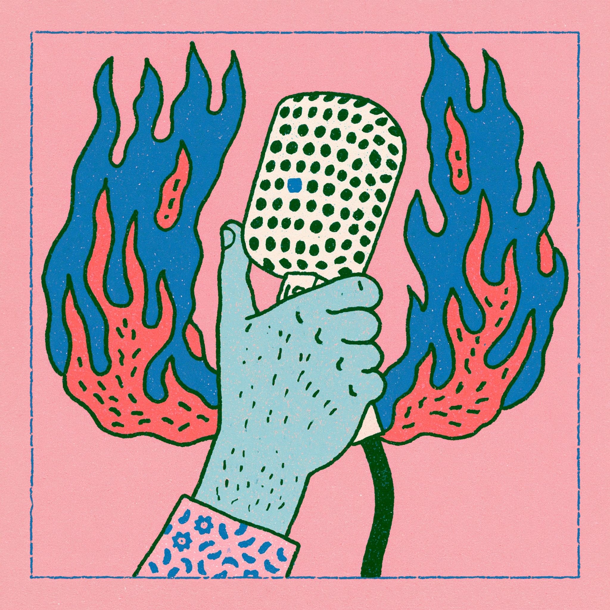 A hand holding a rock mic surrounded by flames