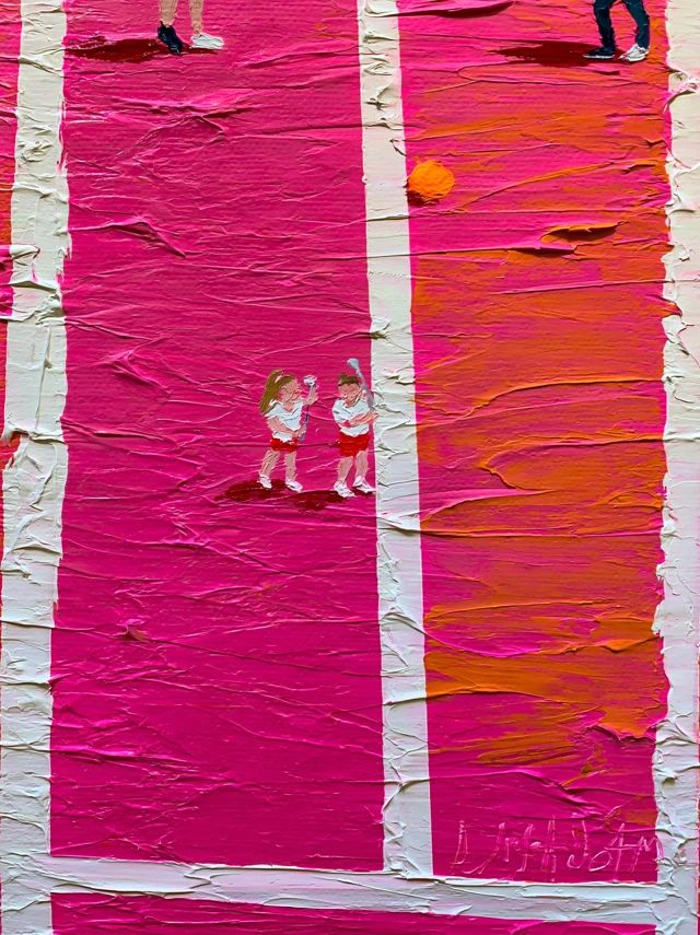 A giant electric pink tennis court has two tiny players and a small bright orange tennis ball
