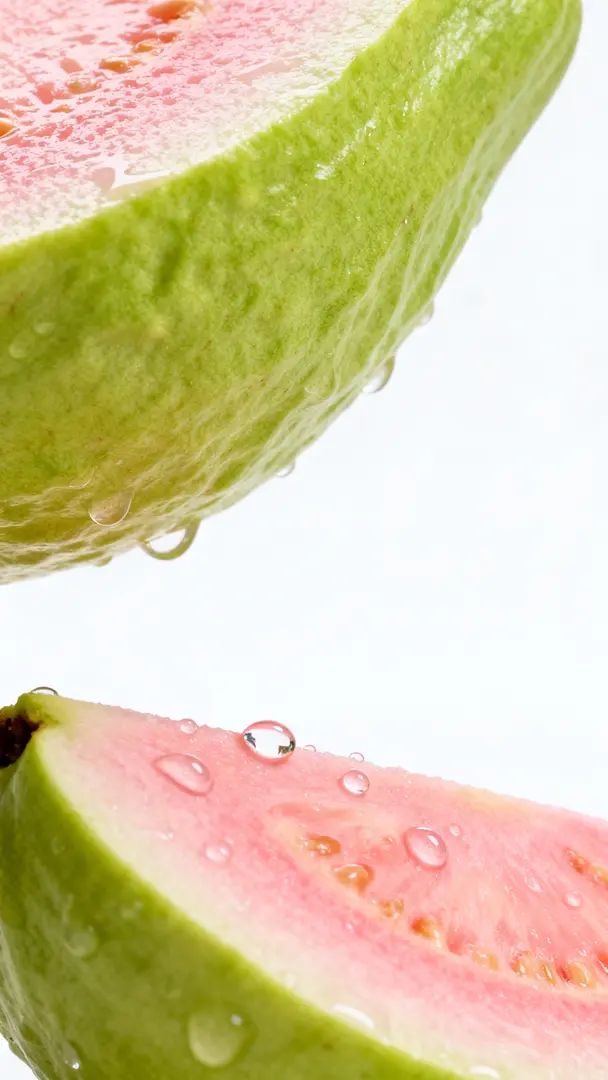 Minimalist realistic food photography showcases a close-up of guava slice