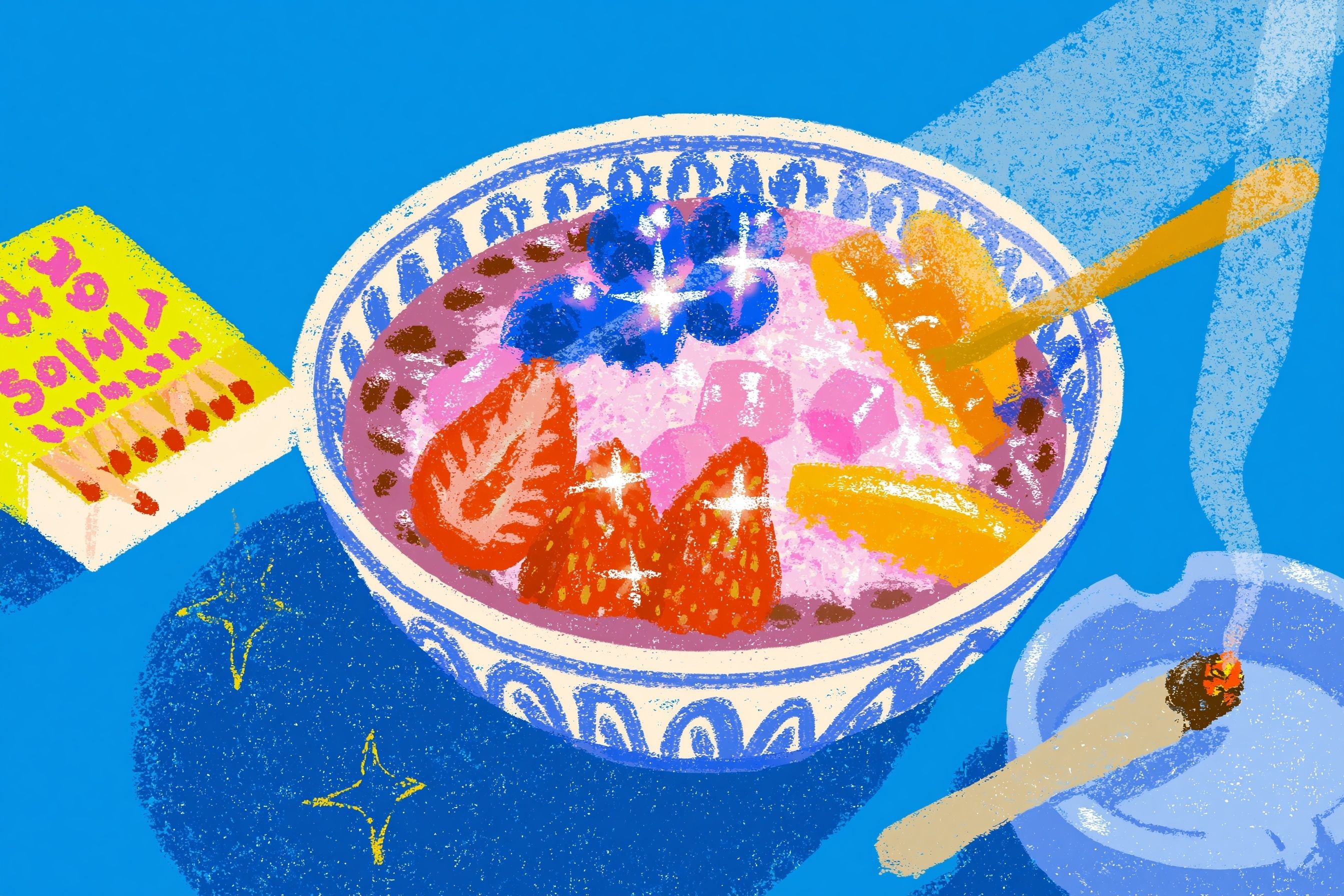 A large bowl of Korean red bean shave ice with fruit pieces next to a lit joint and a box of matches
