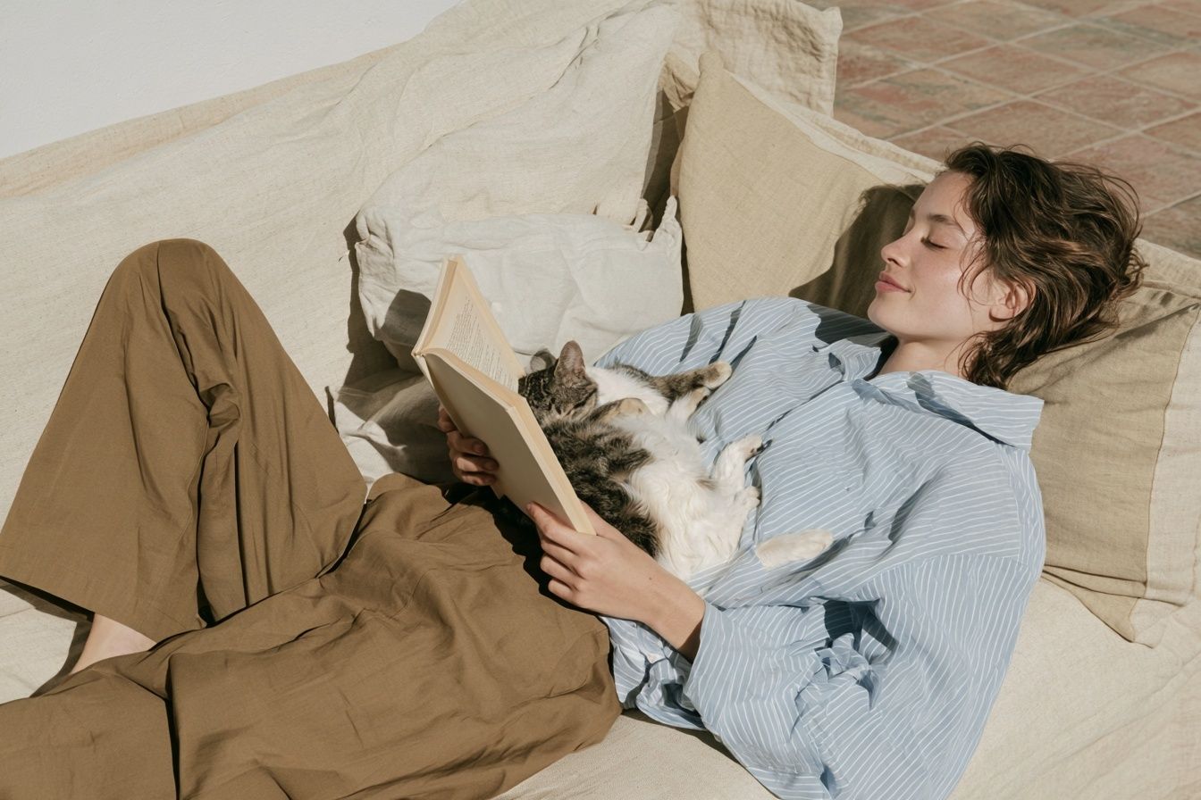 A 20-year-old girl fell asleep with a book in her cozy new apartment