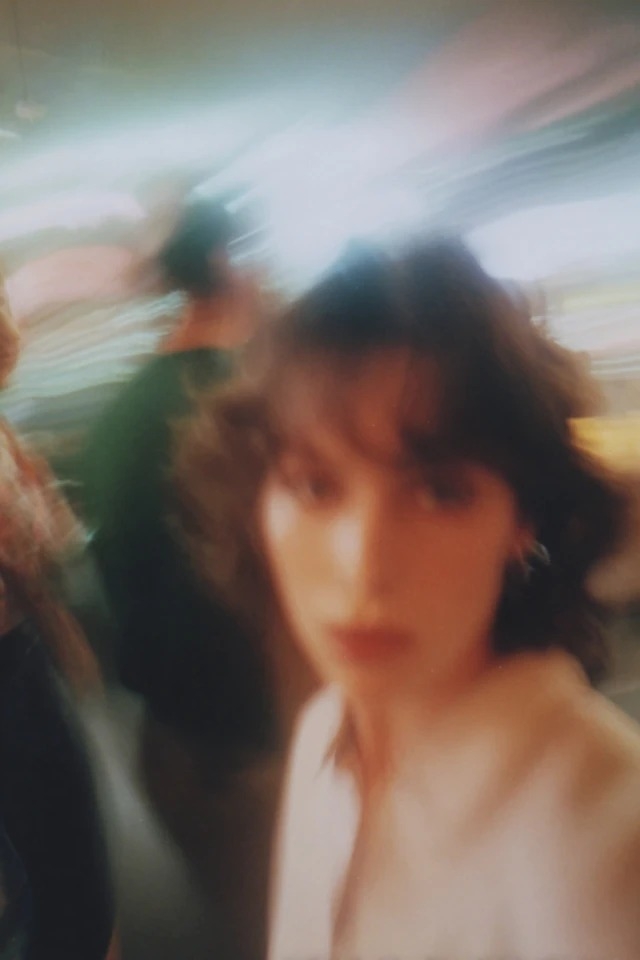 Dreamy analog motion blur with warm amber and cool teal tones
